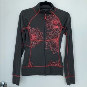 North Face zip up jacket with floral detailing